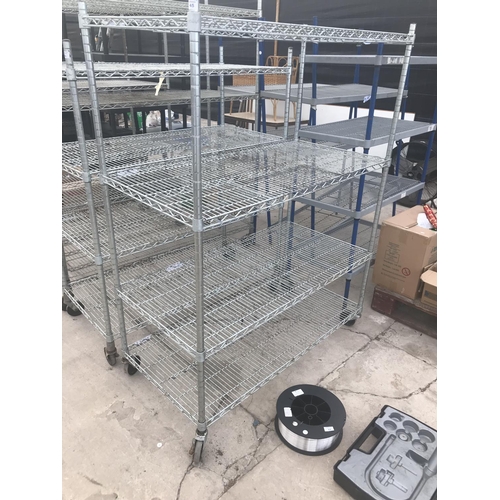 45 - A WHEELED SHELVING UNIT WITH FOUR SHELVES 121CM X 60CM X 161CM HIGH