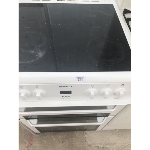 131 - A BEKO BDVC664W DOUBLE OVEN, GRILL AND CERAMIC HOB