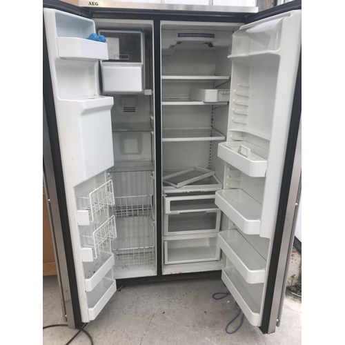 144 - AN AEG AMERICAN STYLE SILVER FRIDGE FREEZER IN WORKING ORDER