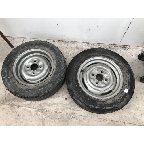 6 - TWO WHEELS AND TYRES - A FORD ESCORT MARK 1 155/SR12 AND A 5.20 X 13