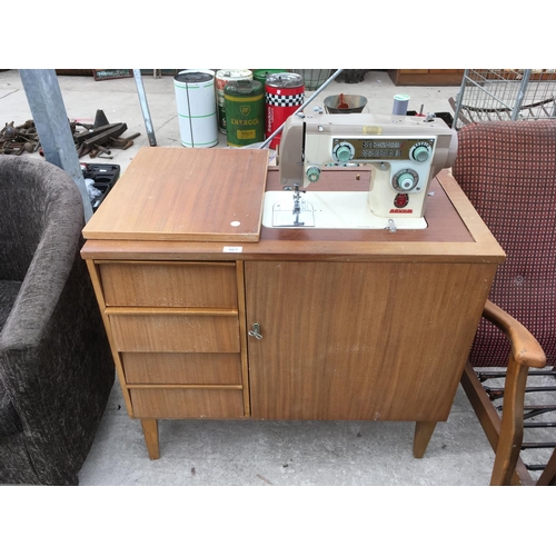 967 - A NOVUM SEWING MACHINE IN A TEAK EFFECT CABINET