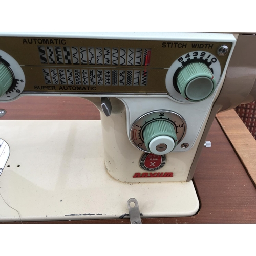 967 - A NOVUM SEWING MACHINE IN A TEAK EFFECT CABINET