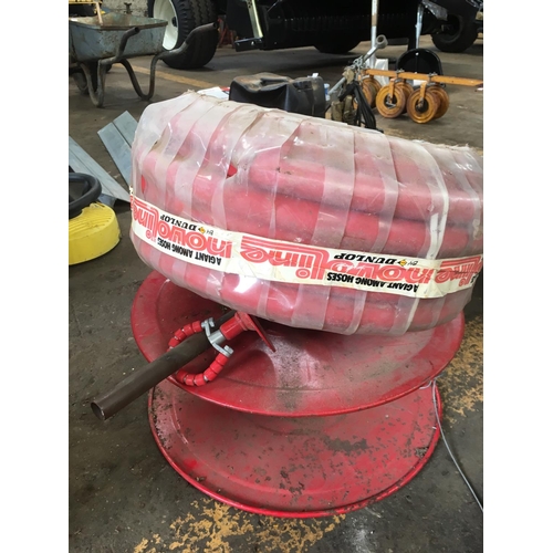 13 - A RED 25MM FIRE HOSE 30.5M LONG WITH REEL