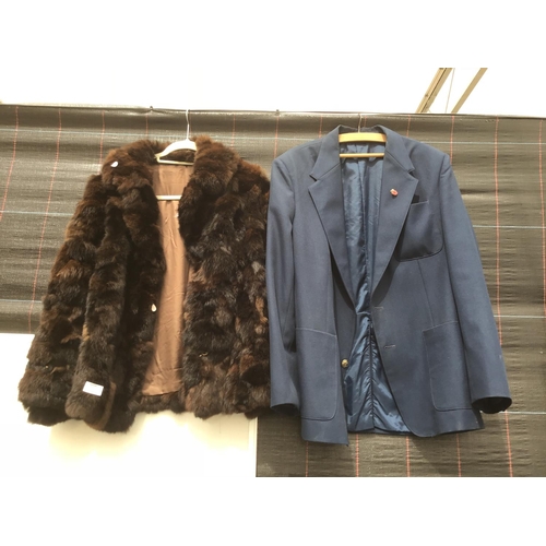 182 - A FUR JACKET AND A BLUE BLAZER