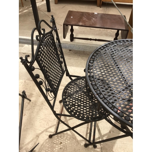 222 - AN ORNATE BISTRO STYLE TABLE WITH TWO MATCHING CHAIRS