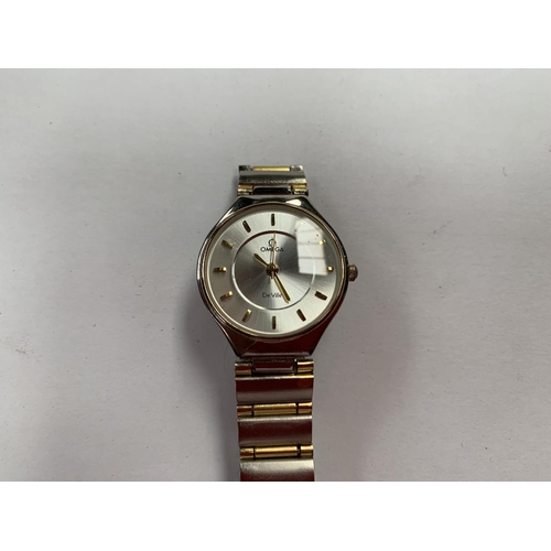 894 - A LADIES FASHION WRIST WATCH