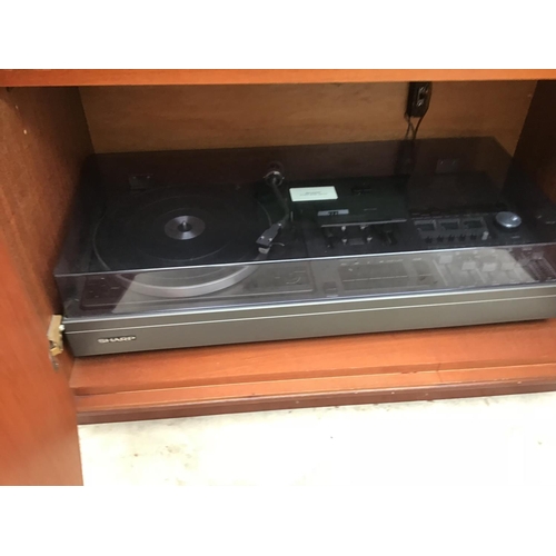 1143 - A MUSIC CABINET WITH SHARP MUSIC CENTRE AND SPEAKERS