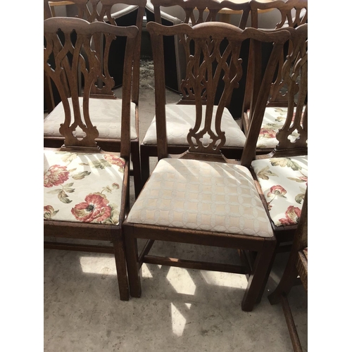 1172 - A CIRCULAR FRENCH OAK DROP LEAF DINING TABLE TOGETHER WITH MATCHING SEVEN DINING CHAIRS