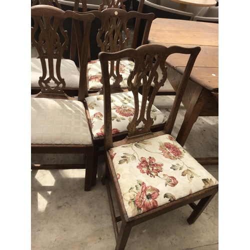 1172 - A CIRCULAR FRENCH OAK DROP LEAF DINING TABLE TOGETHER WITH MATCHING SEVEN DINING CHAIRS