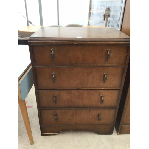 1175 - AN OAK THREE PIECE BEDROOM SUITE - A DRESSING TABLE, WARDROBE AND CHEST OF FOUR DRAWERS