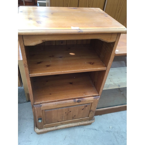 1227 - A PINE SINGLE DOOR CABINET AND TEAK BOOKCASE WITH SLIDING DOORS (2)