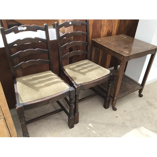 1236 - AN OAK TEA TROLLEY AND TWO LADDER BACK DINING CHAIRS