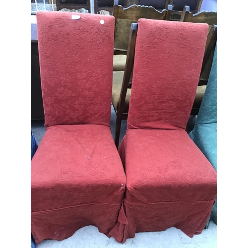 1250 - A SET OF SIX DINING CHAIRS WITH COLOURED COVERS