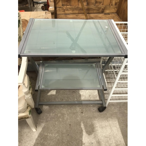 1330 - A MODERN GLASS DESK UNIT AND TWO MESH DRAWER FILING UNITS (3)