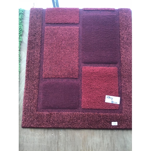 1338 - AN AS NEW PATTERNED RUG 150CM X 80CM