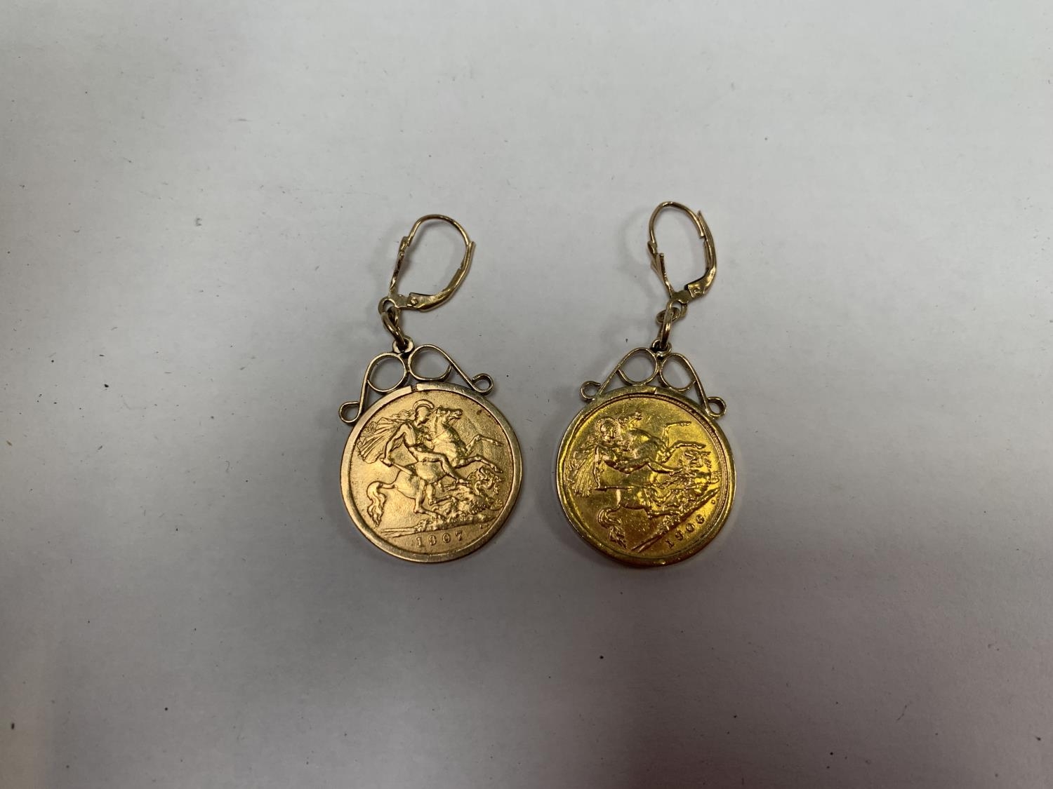 Gold store sovereign earrings