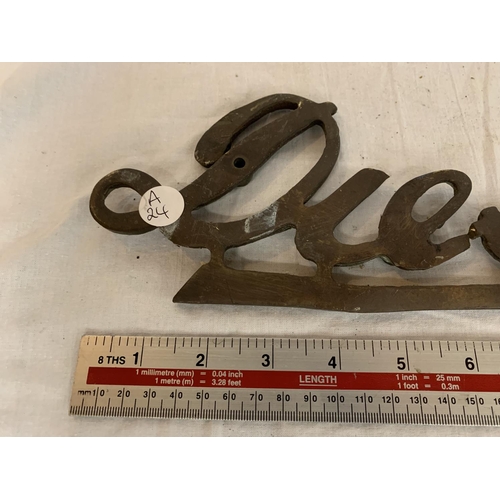 10 - A VINTAGE METAL DIESEL SIGN (A/F) APPROX 29CM LONG