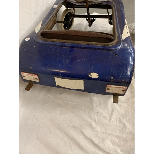 23 - A VINTAGE TORING WOEI CHILDRENS PEDAL RACING CAR IN BLUE