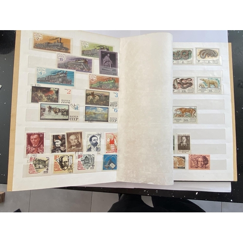 210 - A STAMP ALBUM CONTAINING RUSSIAN STAMPS