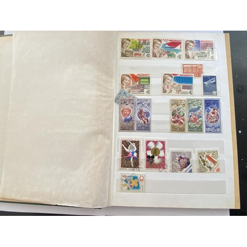 210 - A STAMP ALBUM CONTAINING RUSSIAN STAMPS