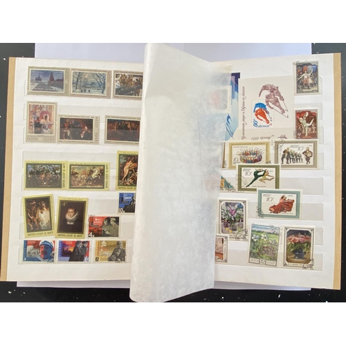 210 - A STAMP ALBUM CONTAINING RUSSIAN STAMPS