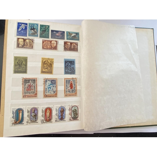 210 - A STAMP ALBUM CONTAINING RUSSIAN STAMPS