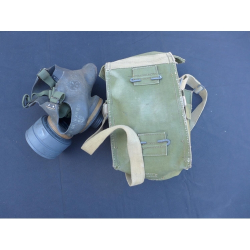 303 - A BRITISH GAS MASK AND CASE