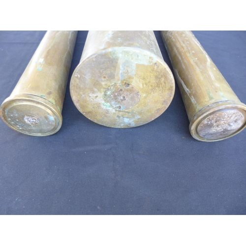 311 - A BRASS SHELL CASE DATED 1942 AND TWO BRASS BOFORS SHELL CASES