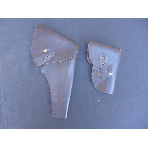 318 - TWO BLACK LEATHER PISTOL HOLSTERS