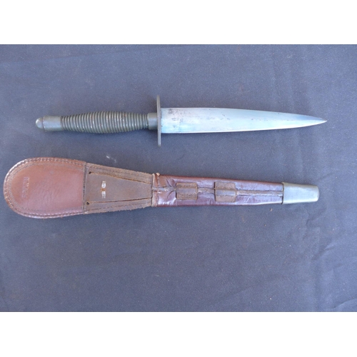 322 - A FAIRBAIRN SYKES KNIFE AND SCABBARD  17.5 CM BLADE