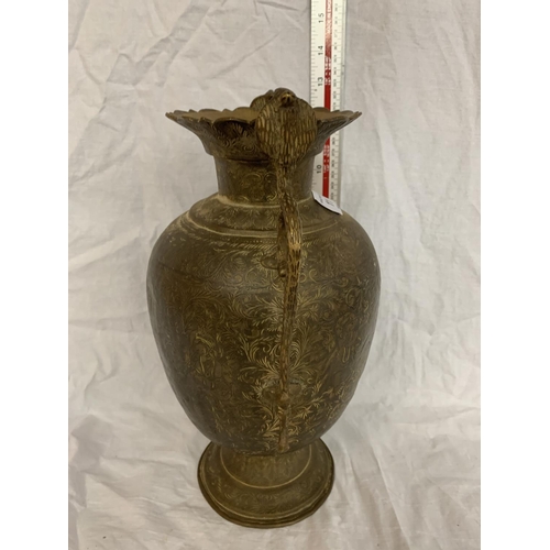 11 - A TALL BRASS VASE WITH COBRA STYLE HANDLES