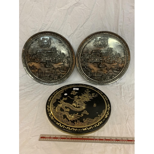 26 - THREE ORNATE CIRCULAR TINS WITH LIDS ONE DEPICTING AN ORIENTAL DRAGON AND TWO ANCIENT LONDON