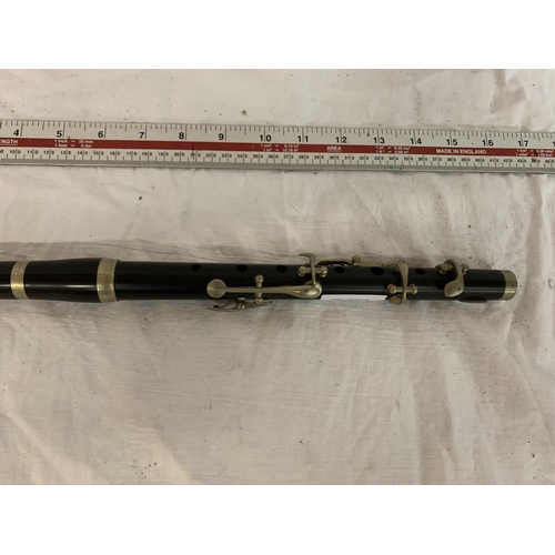 27 - A BARNES AND MULLINS BLACK MILITARY FLUTE WITH A CROWS FOOT