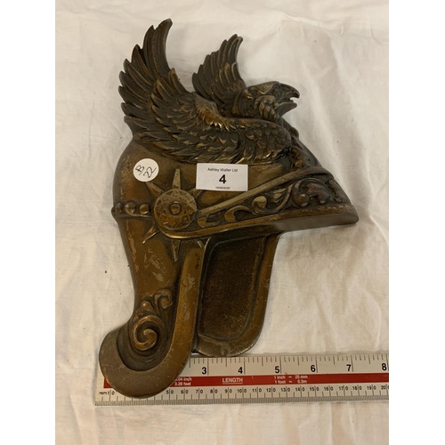 4 - A CENTURION'S BRASS HELMET PLAQUE WITH EAGLE DESIGN