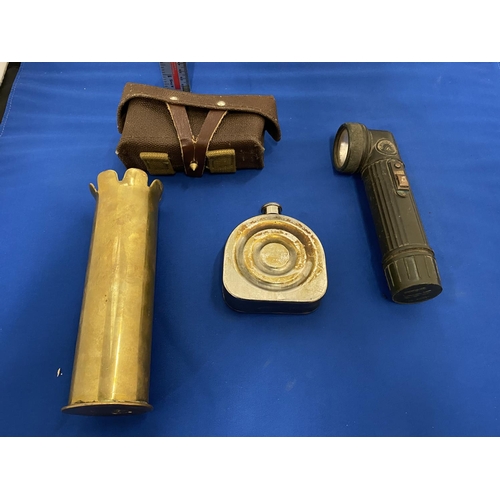 364 - A BRASS SHELL CASE, OIL CAN, BULLET POUCH AND TORCH