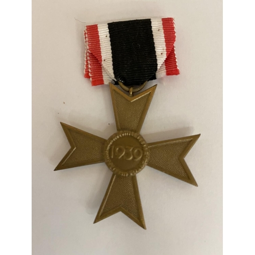 402 - A GERMAN 1939 MERIT CROSS WITH RIBBON