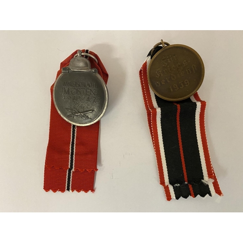 403 - TWO GERMAN MEDALS WITH RIBBONS