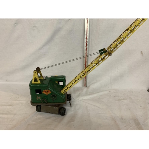 83 - A VINTAGE TIN PLATE TOY CRANE