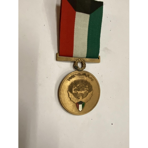 438 - A LIBERATION OF KUWAIT MEDAL AND RIBBON