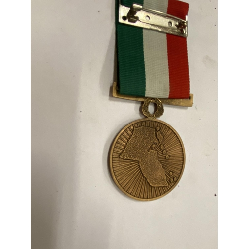 438 - A LIBERATION OF KUWAIT MEDAL AND RIBBON