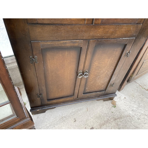 1505 - A PRIORY STYLE FLAT FRONT OAK CORNER CUPBOARD WITH TWO LOWER DOORS AND TWO UPPER LEAD GLAZED DOORS