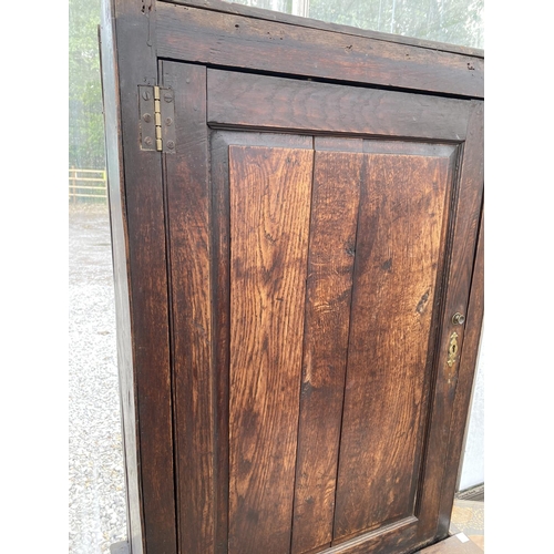 1506 - A GEORGIAN OAK LARDER CUPBOARD WITH ONE LOWER AND ONE UPPER DOOR