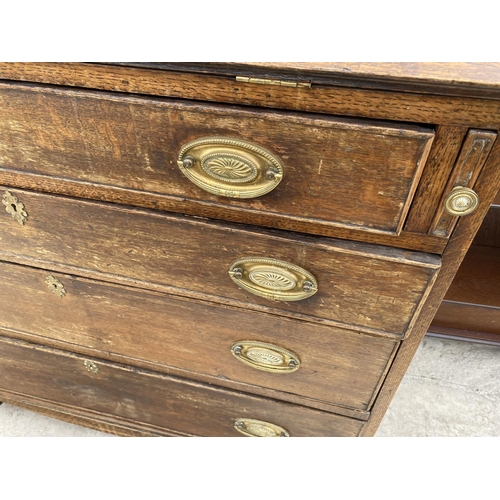 1510 - A GEORGIAN OAK BUREAU ON BRACKET FEET WITH FALL FRONT WITH FOUR DRAWERS HAVING BRASS HANDLES AND ESC... 