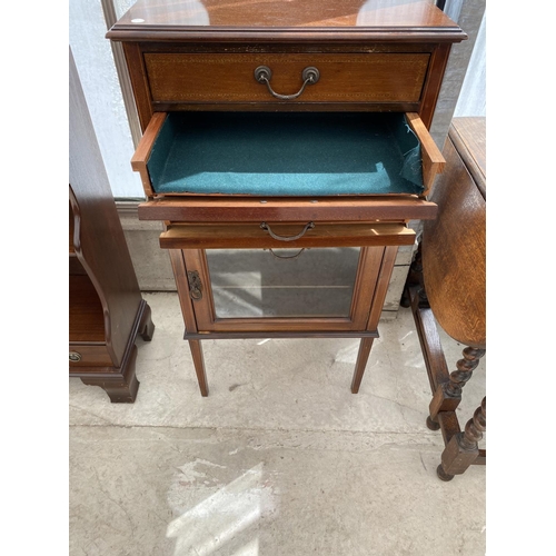 1512 - A MAHOGANY MUSIC CABINET ON TAPERED SUPPORTS WITH GLAZED LOWER DOOR AND THREE DRAWERS, TWO HAVING FA... 