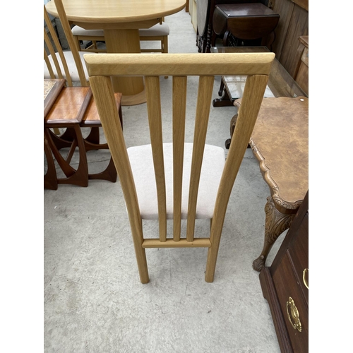 1516 - AN GALA FURNITURE OAK FLIP LEAF TABLE (DIAMETER 150 CM) AND FOUR MATCHING HIGH BACK OAK DING CHAIRS ... 