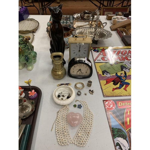 106 - VARIOUS ITEMS TO INCLUDE A TALL BLACK CAT, A BRASS WEIGHT, CLOXKS, JEWELLERY ETC