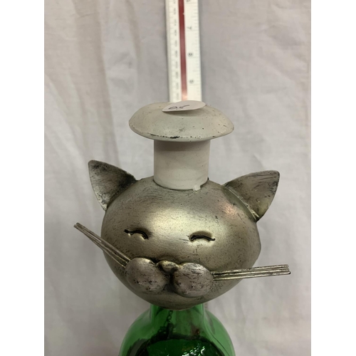 109 - A METAL CAT WINE BOTTLE HOLDER