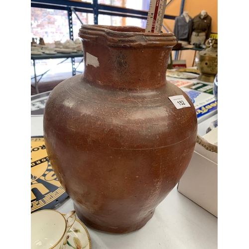 152 - A LARGE GLAZED EARTHENWARE JUG 34CM TALL A/F