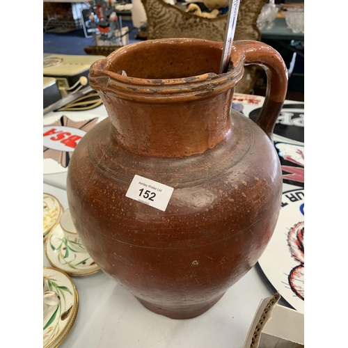 152 - A LARGE GLAZED EARTHENWARE JUG 34CM TALL A/F