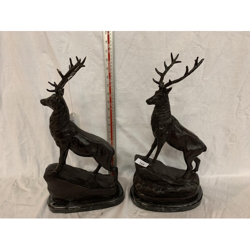 165 - A PAIR OF IMPRESSIVE BRONZE STAGS ON MARBLE BASES APPROXIMATELY 42CM HIGH